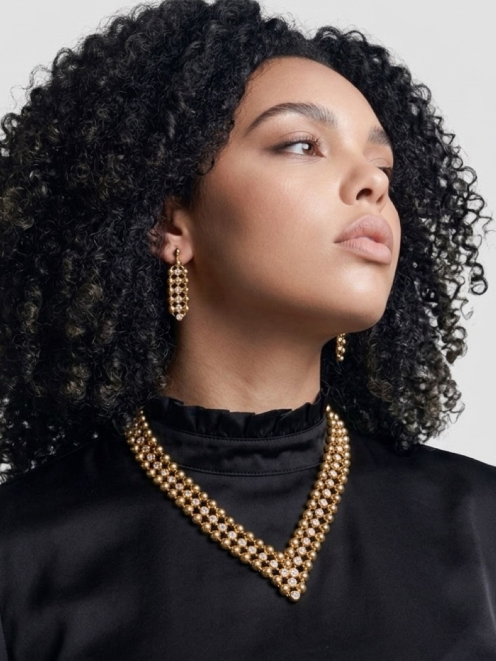 Gold Tone beaded V-shaped necklace and matching drop earrings set